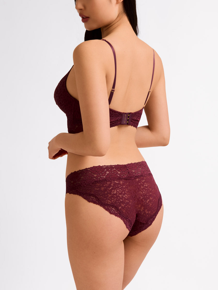 Woman wearing maroon burgundy lace luxe bra and bikini from LoveSuze-Back view